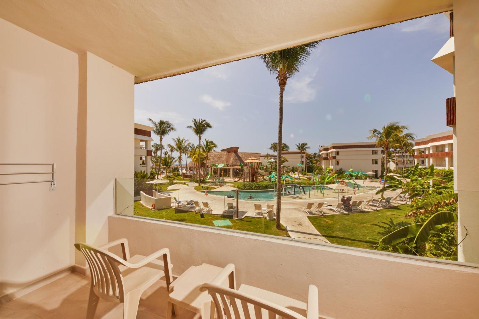 Bahia Principe Grand Tulum Hotel Riviera Maya Exterior photo Balcony view of the pool at the Grand at Moon Palace